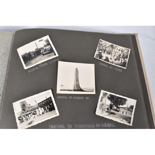 211 - TWO 1936 BERLIN OLYMPIC ALBUMS OF PHOTOGRAPHS, ticket stubs, stamped postcards, the first album cont... 