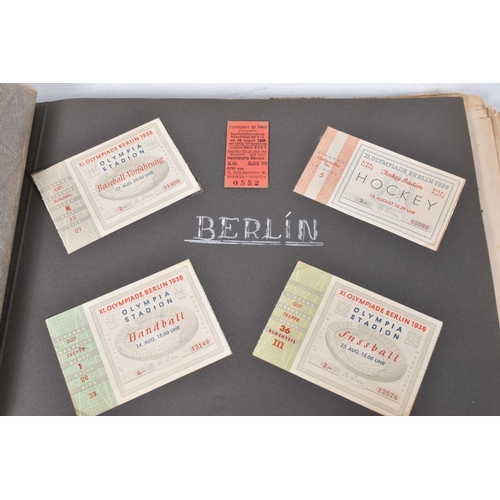 211 - TWO 1936 BERLIN OLYMPIC ALBUMS OF PHOTOGRAPHS, ticket stubs, stamped postcards, the first album cont... 