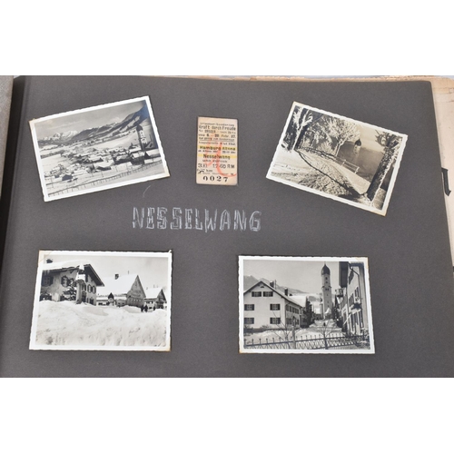 211 - TWO 1936 BERLIN OLYMPIC ALBUMS OF PHOTOGRAPHS, ticket stubs, stamped postcards, the first album cont... 