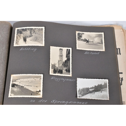 211 - TWO 1936 BERLIN OLYMPIC ALBUMS OF PHOTOGRAPHS, ticket stubs, stamped postcards, the first album cont... 