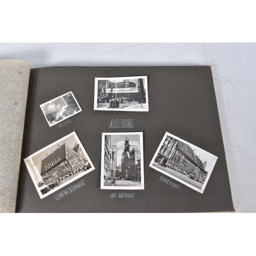 211 - TWO 1936 BERLIN OLYMPIC ALBUMS OF PHOTOGRAPHS, ticket stubs, stamped postcards, the first album cont... 