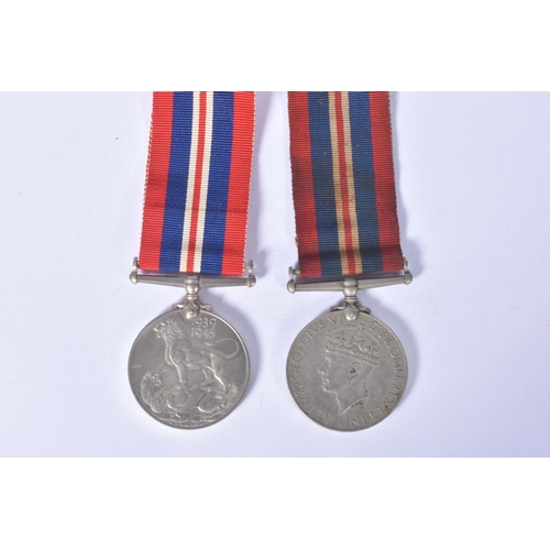 221 - A SELECTION OF BRITISH AND FRENCH MILITARY RELATED ITEMS, to include, three WWII medals, safe drivin... 