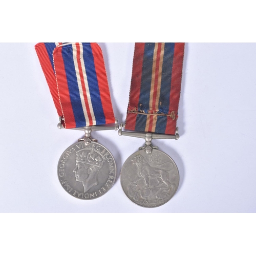 221 - A SELECTION OF BRITISH AND FRENCH MILITARY RELATED ITEMS, to include, three WWII medals, safe drivin... 