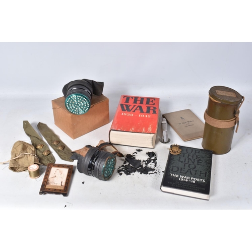 224 - A SELECTION OF MILITARY ITEMS TO INCLUDE, two gas masks, one is badly damaged and the other is a civ... 