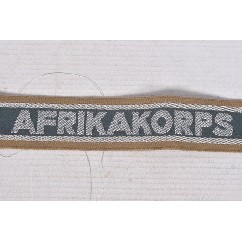 232 - A WWII ERA GERMAN AFRIKA CORPS WRIST CUFF, this is black with silver lettering with gold edges, it m... 