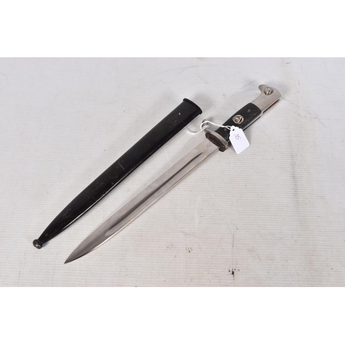 234 - A GERMAN DRESS DAGGER MADE BY WKC, this has the black grip and black scabbard, the blade has no mott... 