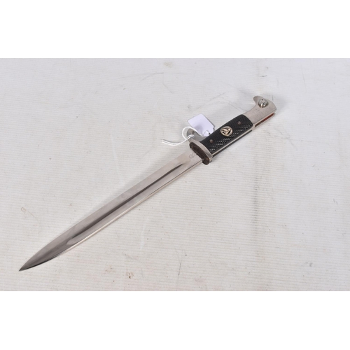 234 - A GERMAN DRESS DAGGER MADE BY WKC, this has the black grip and black scabbard, the blade has no mott... 