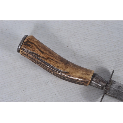 236 - TWO GERMAN BONE/HORN HANDLED DAGGERS, the first is unmarked on the blade and comes in a leather scab... 