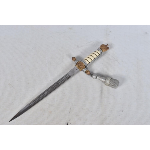 238 - A GERMAN THIRD REICH NAVY OFFICERS DAGGER, this has a white wire bound grip and the pommel features ... 