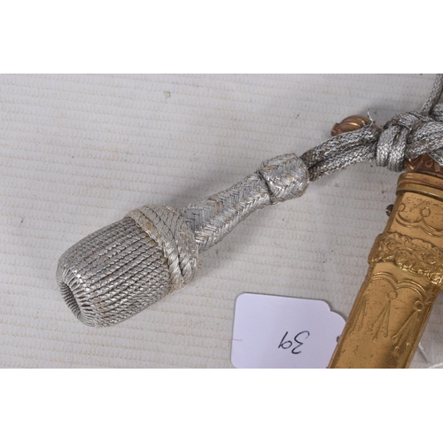 238 - A GERMAN THIRD REICH NAVY OFFICERS DAGGER, this has a white wire bound grip and the pommel features ... 