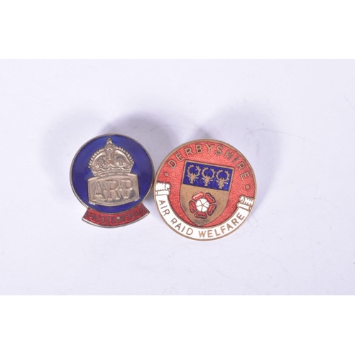 252 - TWO WWI ERA ARP BADGES, these include a Chesterfield ARP with button hole fitting and blue and red e... 