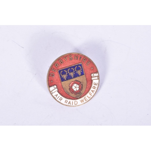 252 - TWO WWI ERA ARP BADGES, these include a Chesterfield ARP with button hole fitting and blue and red e... 