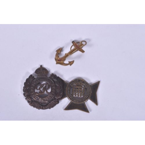 270 - A SELECTION OF MILITARY CAP BADGES, shoulder titles and rank PIPS to include a kings Crown RAF Pilot... 