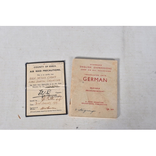 274 - AN AIR RAID WARDEN POCKET BOOKLET, to a Hugh Wesley Corder, Little Dunmow, Chelmsford, on his appoin... 