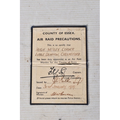 274 - AN AIR RAID WARDEN POCKET BOOKLET, to a Hugh Wesley Corder, Little Dunmow, Chelmsford, on his appoin... 