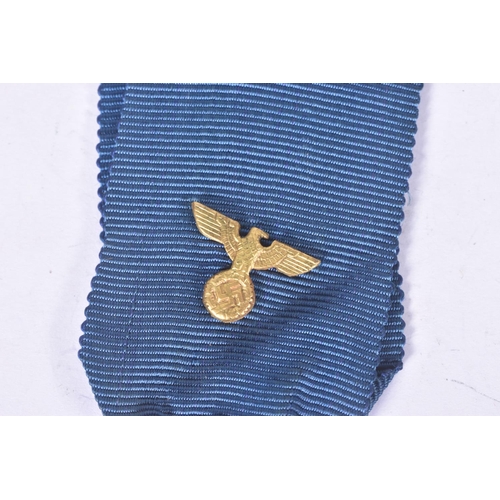 282 - A GERMAN LUFTWAFFE TWELVE YEAR LONG SERVICE MEDAL, the blue ribbon still has the eagle emblem fitted... 