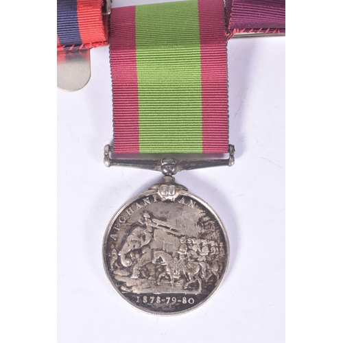 287 - A VICTORIAN GROUP OF FOUR MEDALS AND A STOPWATCH, to include a IGSM with Perak Clasp, second Afghan ... 