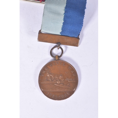 287 - A VICTORIAN GROUP OF FOUR MEDALS AND A STOPWATCH, to include a IGSM with Perak Clasp, second Afghan ... 