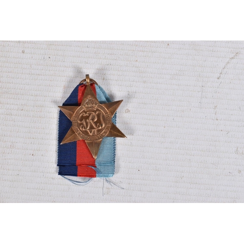 291 - A WWII AND TERRATORIAL EFFICIANCY MEDAL GROUP AND PAPERWORKS, the medals are 1939-45 star and war me... 