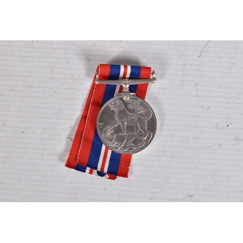 291 - A WWII AND TERRATORIAL EFFICIANCY MEDAL GROUP AND PAPERWORKS, the medals are 1939-45 star and war me... 