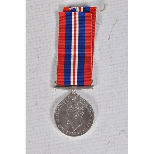 291 - A WWII AND TERRATORIAL EFFICIANCY MEDAL GROUP AND PAPERWORKS, the medals are 1939-45 star and war me... 