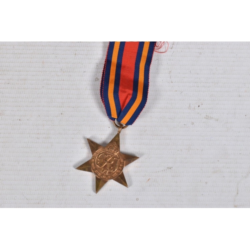 291 - A WWII AND TERRATORIAL EFFICIANCY MEDAL GROUP AND PAPERWORKS, the medals are 1939-45 star and war me... 