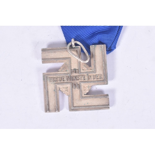 299 - A WWII ERA GERMAN SS TWELVE YEAR LONG SERVICE CROSS, this award features a silvered cross in the for... 