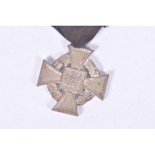 300 - A THIRD REICH GERMAN TWENTY FIVE YEAR FAITHFUL SERVICE CROSS, this cross is silvered with an enamel ... 