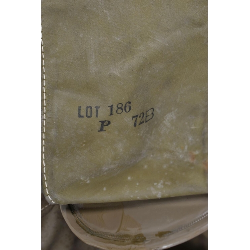 301 - A WWII ERA HOME FRONT BABIES GAS MASK, this is in good condition for its age and is date 1939, pleas... 