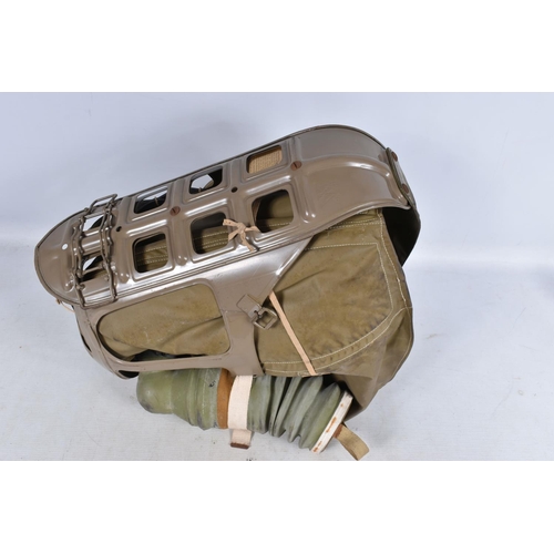 301 - A WWII ERA HOME FRONT BABIES GAS MASK, this is in good condition for its age and is date 1939, pleas... 