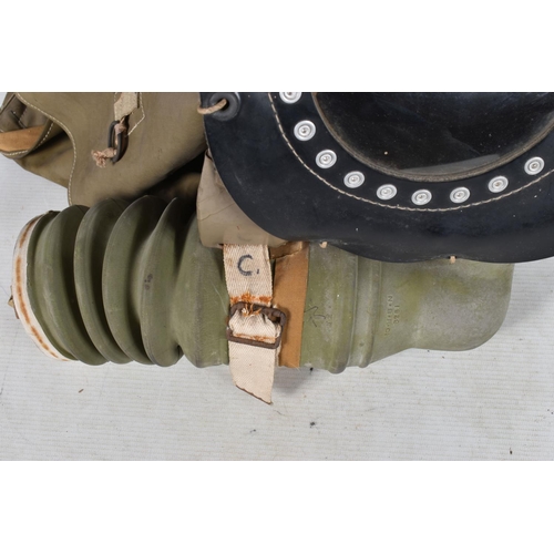 301 - A WWII ERA HOME FRONT BABIES GAS MASK, this is in good condition for its age and is date 1939, pleas... 