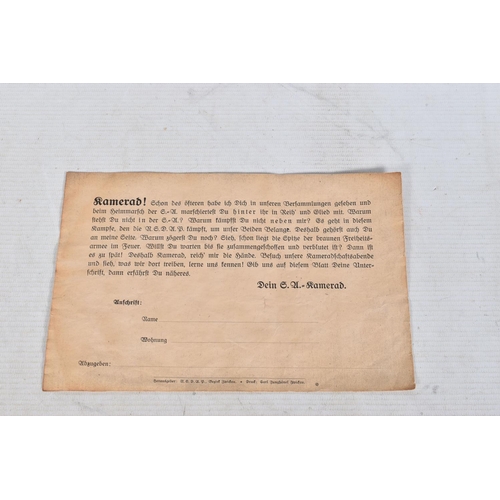 304 - A COLLECTION OF GERMAN WWII DOCUMENTS, to include rations cards, a newspaper print dated 02/05/1945,... 