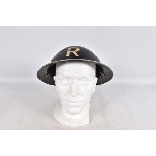 315 - A 1939 DATED WWII STEEL HELMET AND OTHERS, to include six berets and three other hats, the steel hel... 