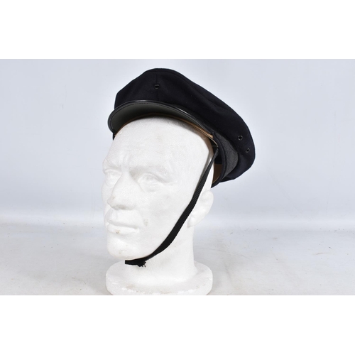 315 - A 1939 DATED WWII STEEL HELMET AND OTHERS, to include six berets and three other hats, the steel hel... 