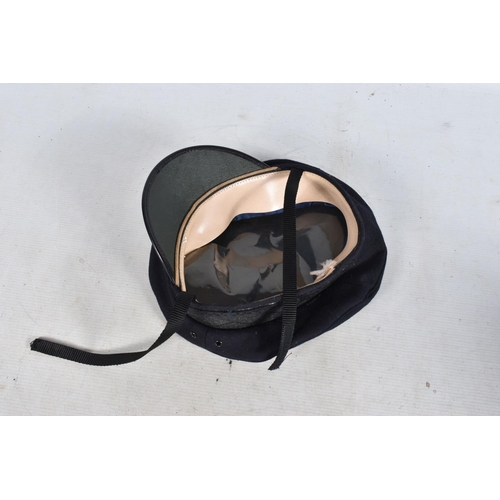 315 - A 1939 DATED WWII STEEL HELMET AND OTHERS, to include six berets and three other hats, the steel hel... 