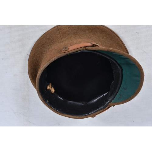 317 - A SELECTION OF WWII ERA AND LATER MILITARY HATS, this lot includes a steel helmet dated 1940 with ne... 