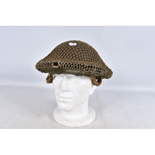 317 - A SELECTION OF WWII ERA AND LATER MILITARY HATS, this lot includes a steel helmet dated 1940 with ne... 