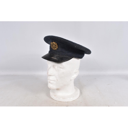 317 - A SELECTION OF WWII ERA AND LATER MILITARY HATS, this lot includes a steel helmet dated 1940 with ne... 