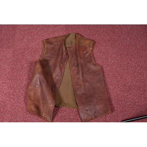 323 - EIGHT ITEMS OF MILITARY CLOTHING, to include WWII dated trousers, this lot includes a pair of 1943 s... 