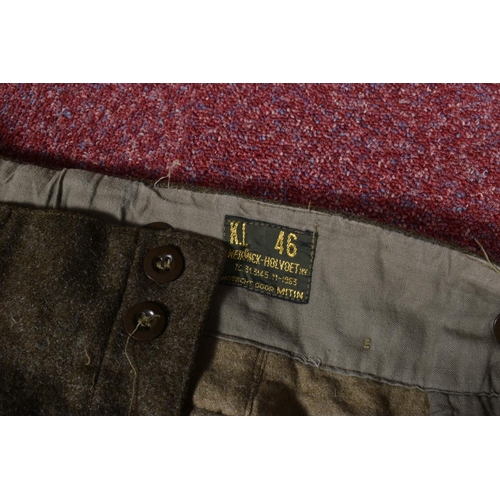 323 - EIGHT ITEMS OF MILITARY CLOTHING, to include WWII dated trousers, this lot includes a pair of 1943 s... 