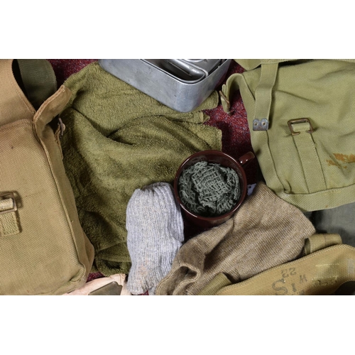 327 - A LARGE SELECTION OF MILITARY RELATED EQUIPTMENT AND BAGS, included in this lot is a kit ideal for a... 