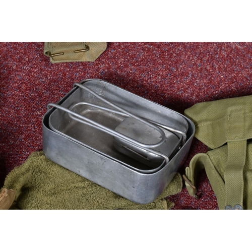 327 - A LARGE SELECTION OF MILITARY RELATED EQUIPTMENT AND BAGS, included in this lot is a kit ideal for a... 