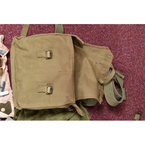 327 - A LARGE SELECTION OF MILITARY RELATED EQUIPTMENT AND BAGS, included in this lot is a kit ideal for a... 