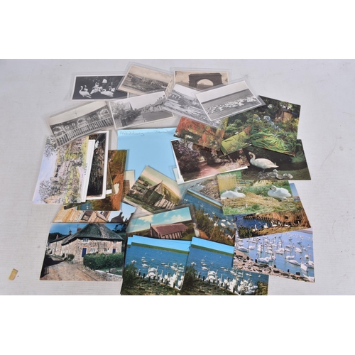 328 - POSTCARDS, a tray containing postcards to various towns and villages in the South-West of England, a... 