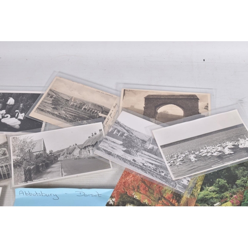 328 - POSTCARDS, a tray containing postcards to various towns and villages in the South-West of England, a... 