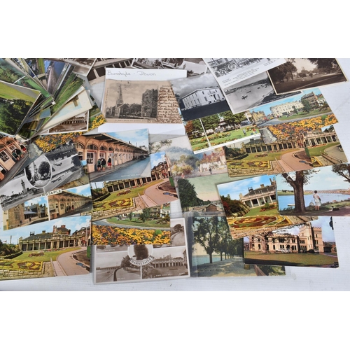 328 - POSTCARDS, a tray containing postcards to various towns and villages in the South-West of England, a... 