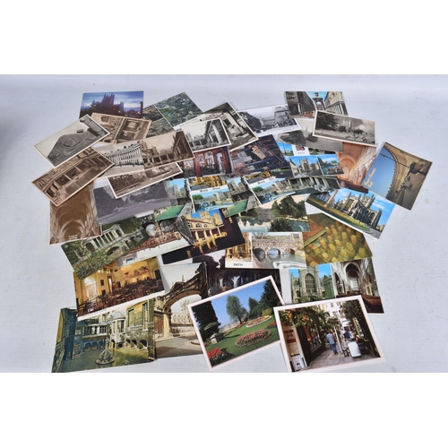 329 - POSTCARDS, a tray containing postcards to various towns and villages in the South-West of England, a... 