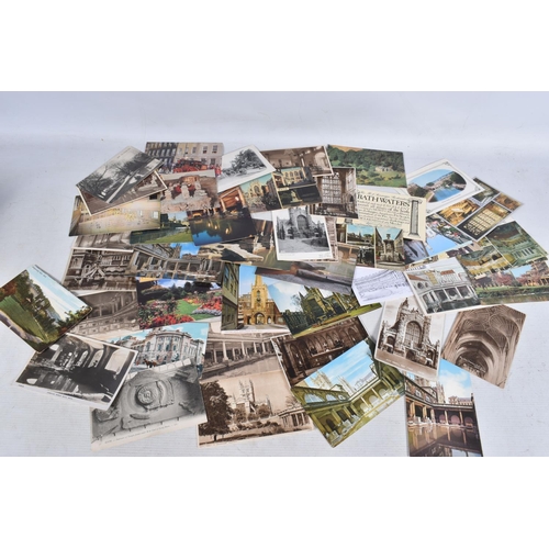 329 - POSTCARDS, a tray containing postcards to various towns and villages in the South-West of England, a... 