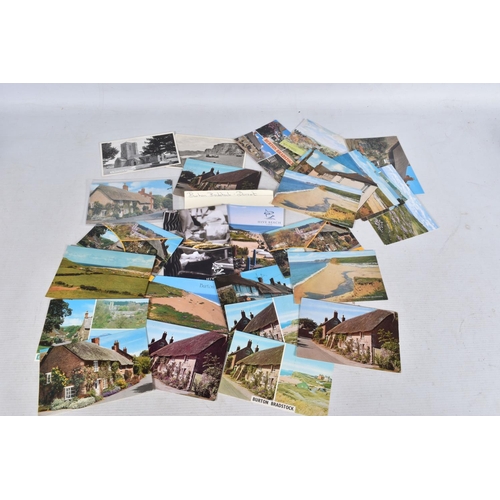 332 - POSTCARDS, a tray containing postcards to various towns and villages in the South-West of England, a... 