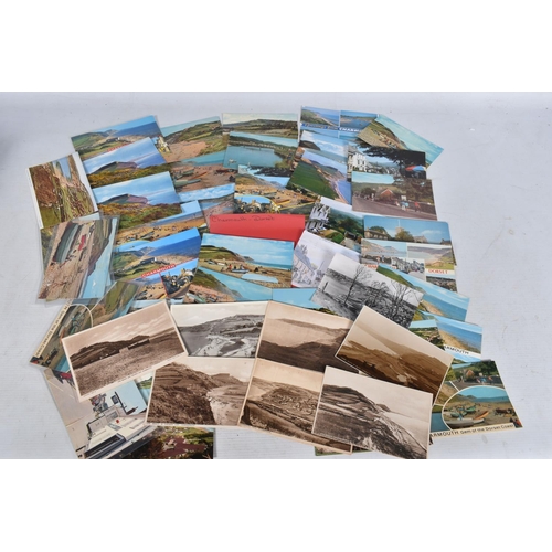 334 - POSTCARDS, a tray containing postcards to various towns and villages in the South-West of England, a... 